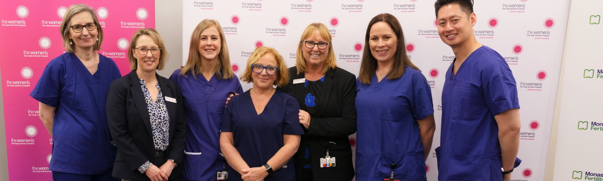 The Women's CEO Sue Matthews (third from right) with A/Prof Kate Stern (centre), welcoming the announcement with other staff from the Women's 