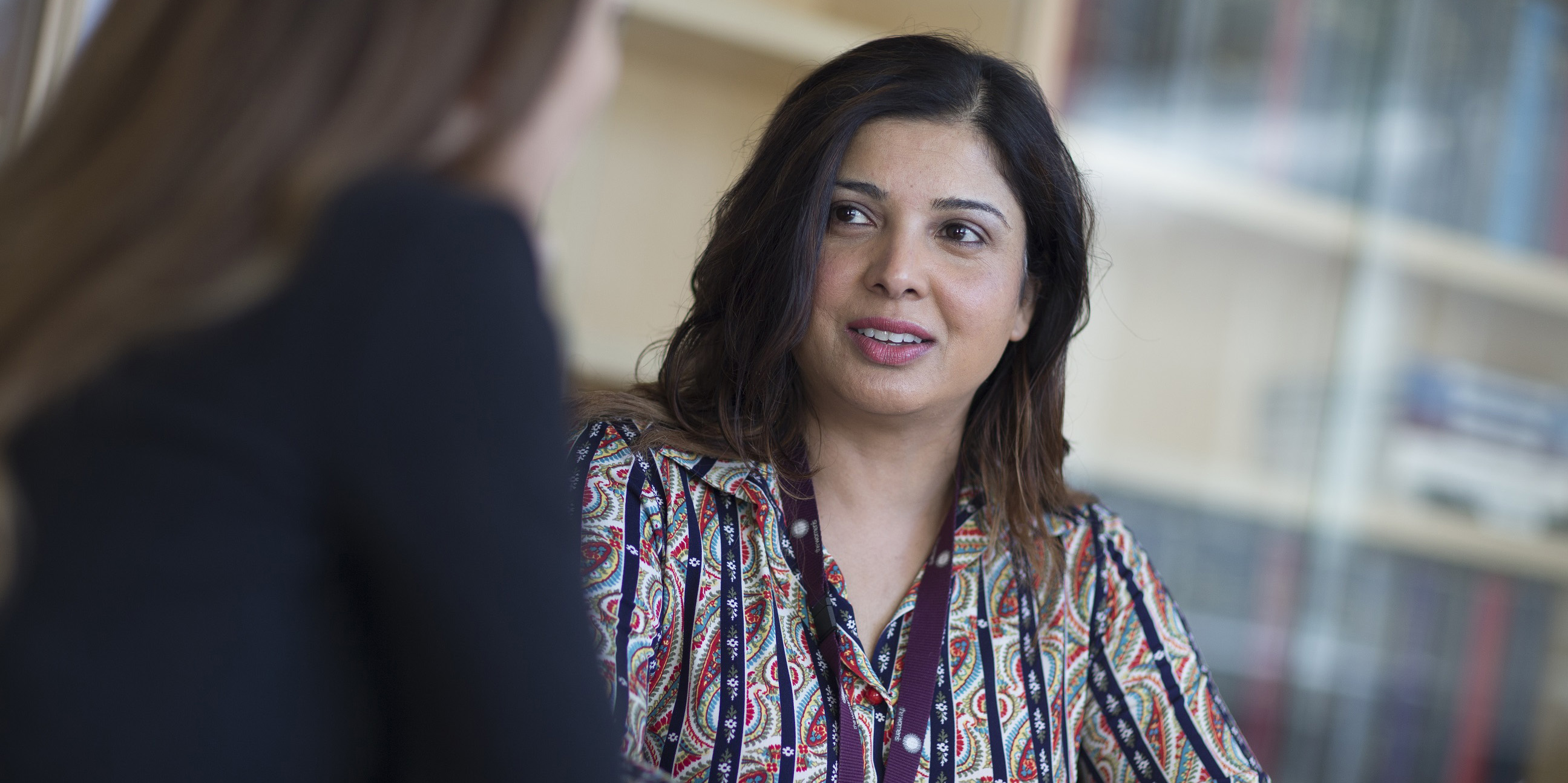 Dr Yasmin Jayasinghe speaking to a patient