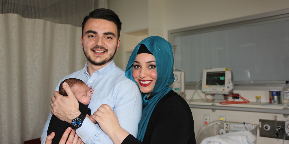 Sare Demir with her husband Burak in the NICU when Yusuf was three months old. 