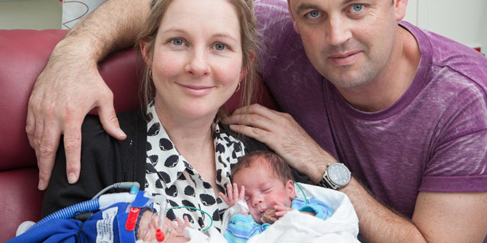 Rachael Sutton and Mark Kerville with twin sons, Sam and Ethan, now six months old.